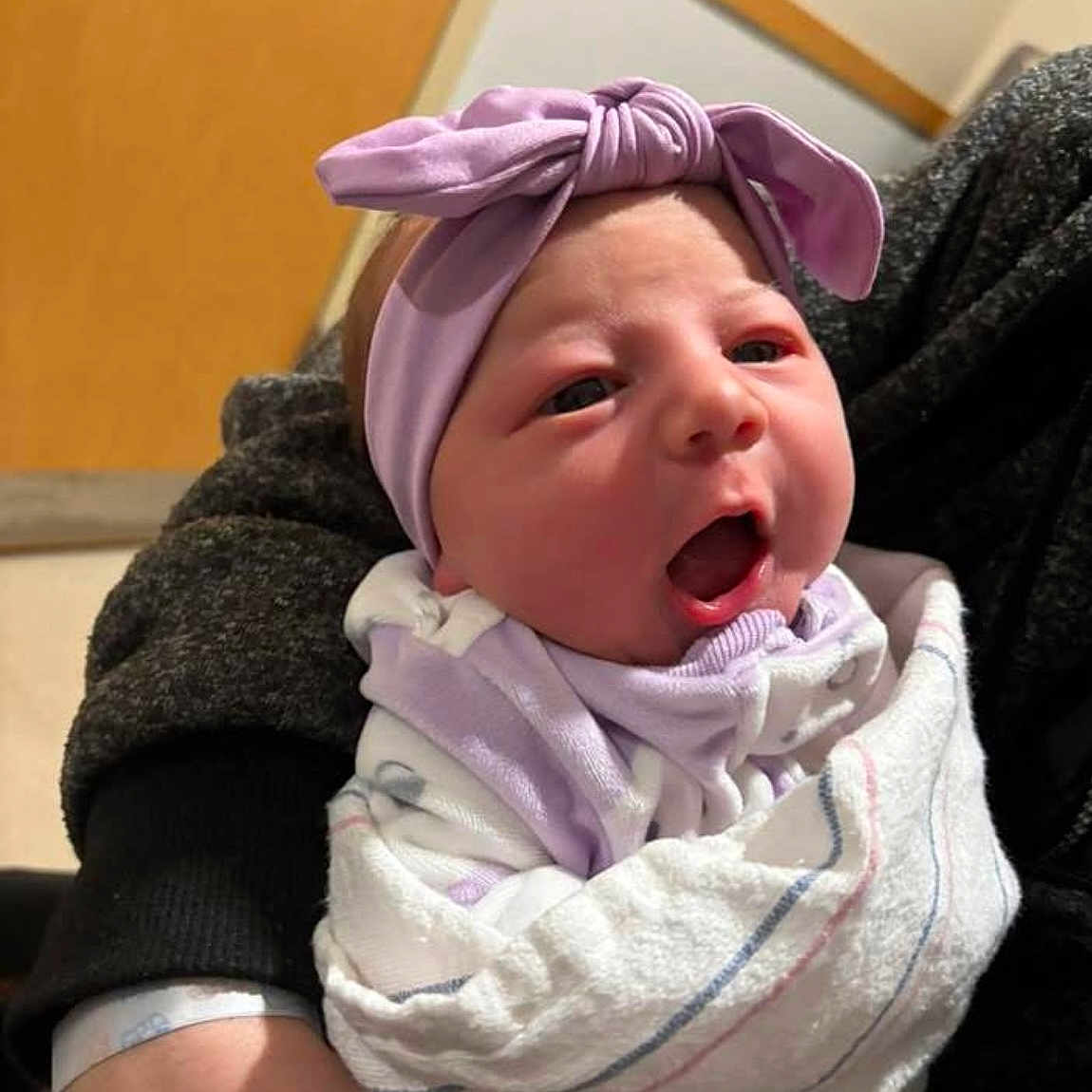 Kaylee is registered to the contest to win money with this photo: baby, blanket, bow, child, closeup, clothing, cute, expression, face, headband, holding, human, indoor, infant, newborn, newborn_baby, person, portrait, soft, wrapped