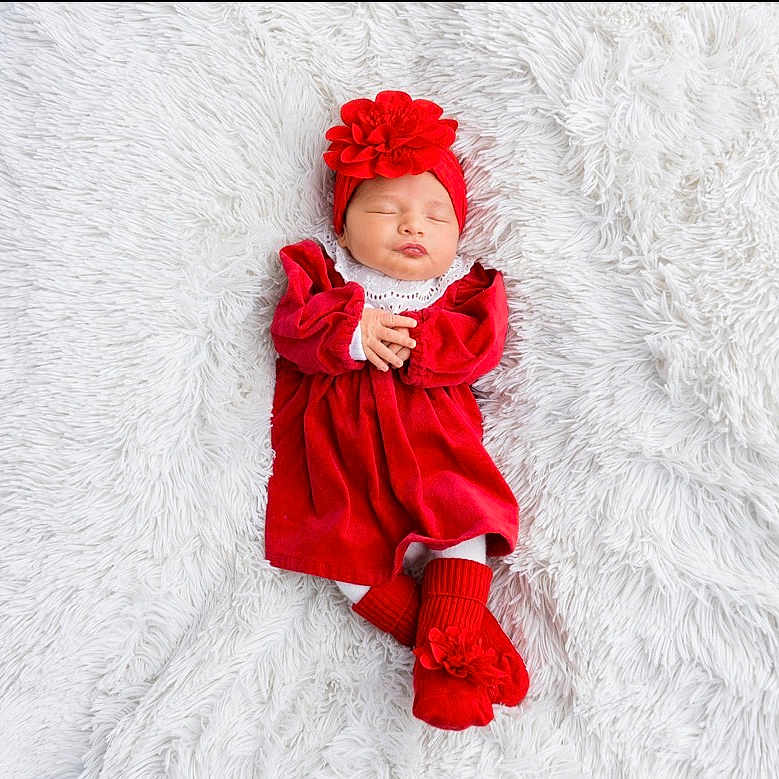 Liyanah participe au concours pour gagner de l'argent avec cette photo : adorable, baby, child, cozy, cute, headband, indoors, infant, lying_down, newborn, peaceful, portrait, red_dress, resting, sleeping, small_hands, socks, soft_texture, warm_clothing, white_blanket