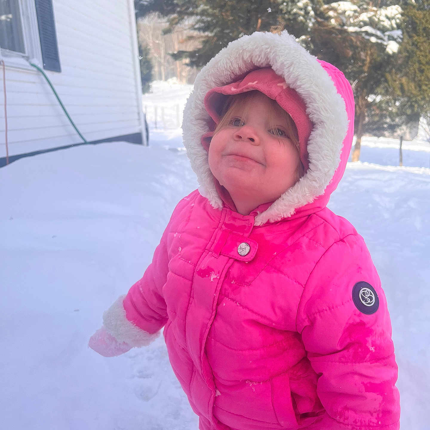 Oakley is registered to the contest to win money with this photo: baby, cap, clothing, coat, face, glove, hat, head, hood, hoodie, jacket, knitwear, nature, outdoors, person, photography, portrait, sweater, sweatshirt, winter