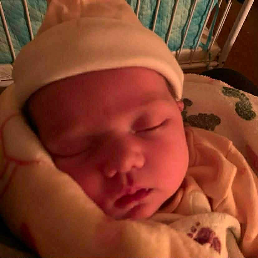 Destiny joined the competition — help win amazing prizes! baby, sleeping, blanket, hat, closeup, infant, face, cozy, soft, indoors, bed, peaceful, child, warm_lighting, portrait, newborn, cushion, rest, nursery, cute