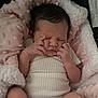 Eriyah is registered to the contest to win money with this photo: baby, newborn, infant, blanket, pink, white_socks, onesie, sleeping, soft_texture, cozy, cute, face, hands, closed_eyes, resting, small, child, indoors, portrait, comfort
