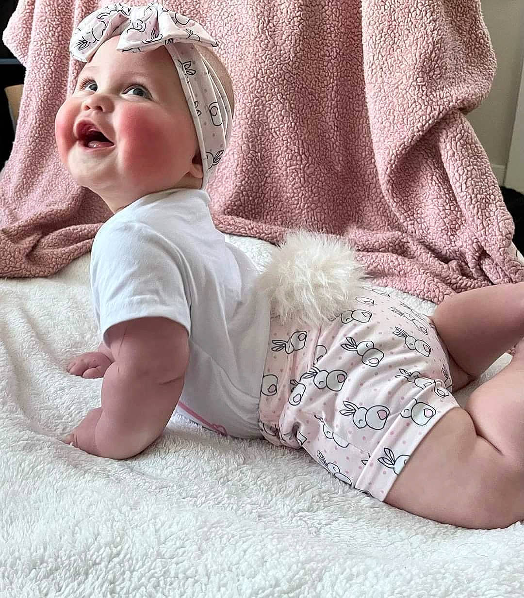 Kalea is registered to the contest to win money with this photo: baby, baby_sleeping, baby_toddler_clothing, cap, comfort, cool, finger, hand, happy, headgear, headwear, human_body, leg, person, pink, skin, sleeve, smile, t_shirt, textile