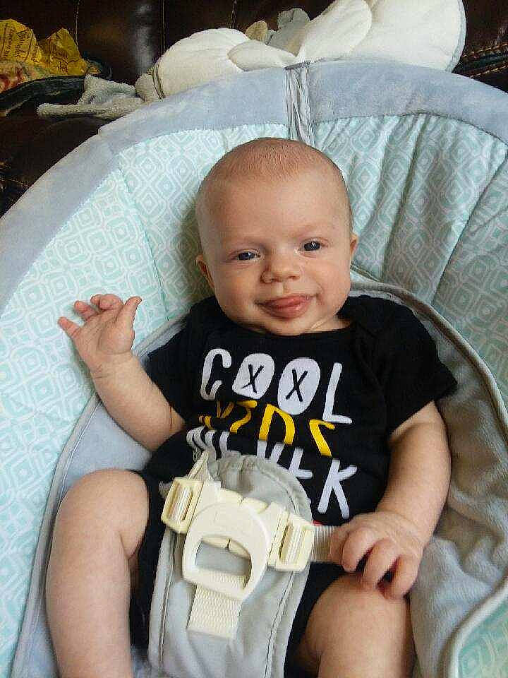 Justin joined the competition — help win amazing prizes! arm, baby_products, child, day, infant, person, product, sitting, smile, toddler