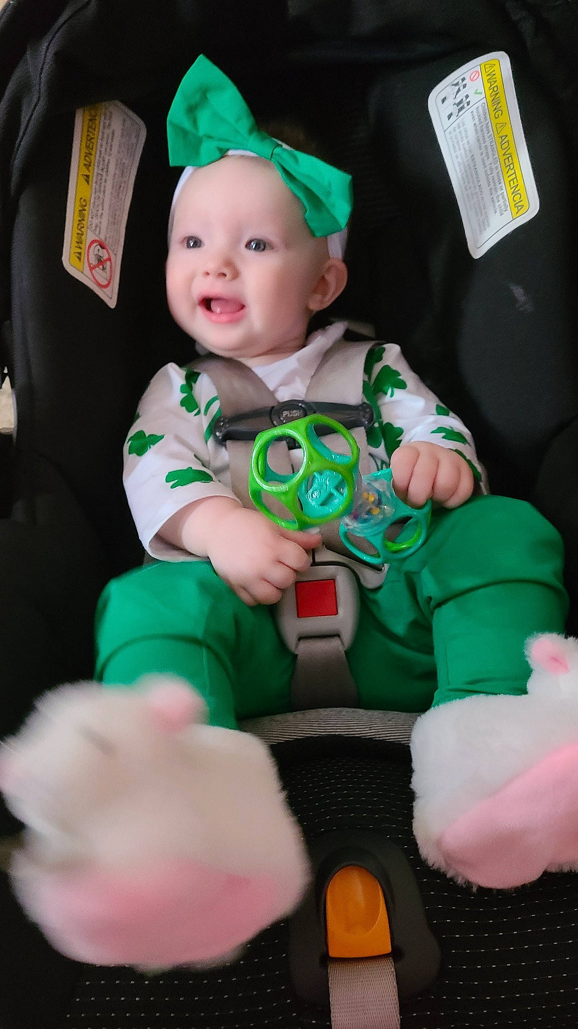 Chloe joined the competition — help win amazing prizes! baby, baby_toddler_clothing, cap, carmine, child, costume_hat, event, face, fictional_character, finger, green, happy, head, headwear, holiday, lap, person, pink, red, sitting