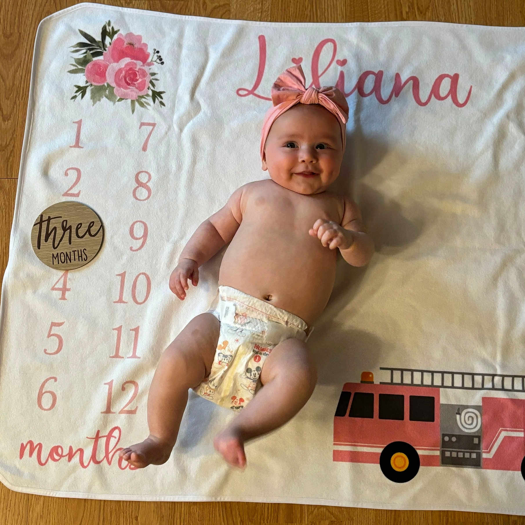 Liliana joined the competition — help win amazing prizes! baby, bus, clothing, cushion, diaper, face, flower, hat, head, homedecor, newborn, person, photography, plant, portrait, quilt, rose, sitting, transportation, vehicle