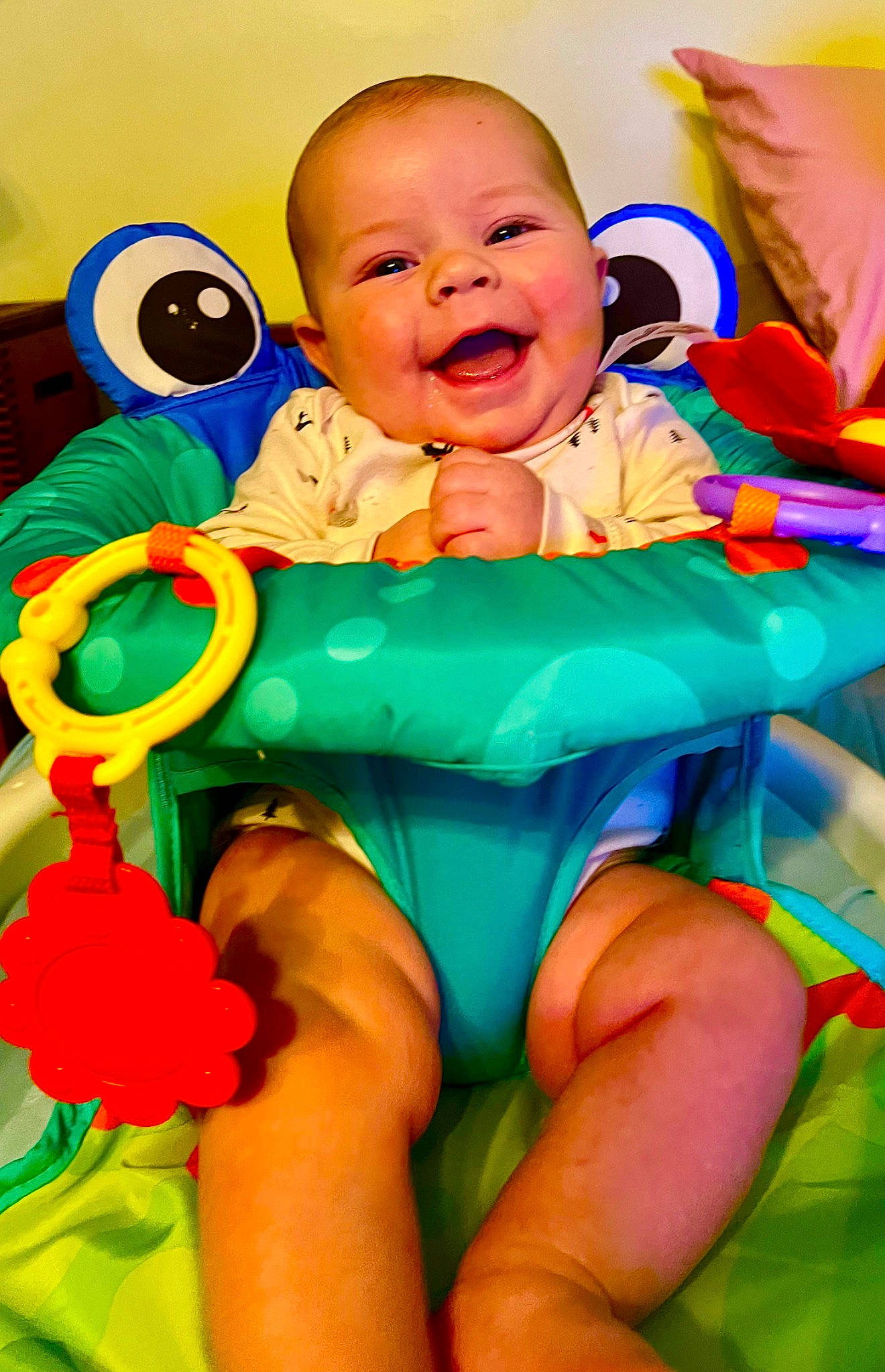 Bennett joined the competition — help win amazing prizes! baby, baby_laughing, baby_playing_with_toys, baby_toddler_clothing, child, comfort, face, facial_expression, finger, fun, happy, head, orange, organ, person, photograph, pink, smile, snapshot, toddler