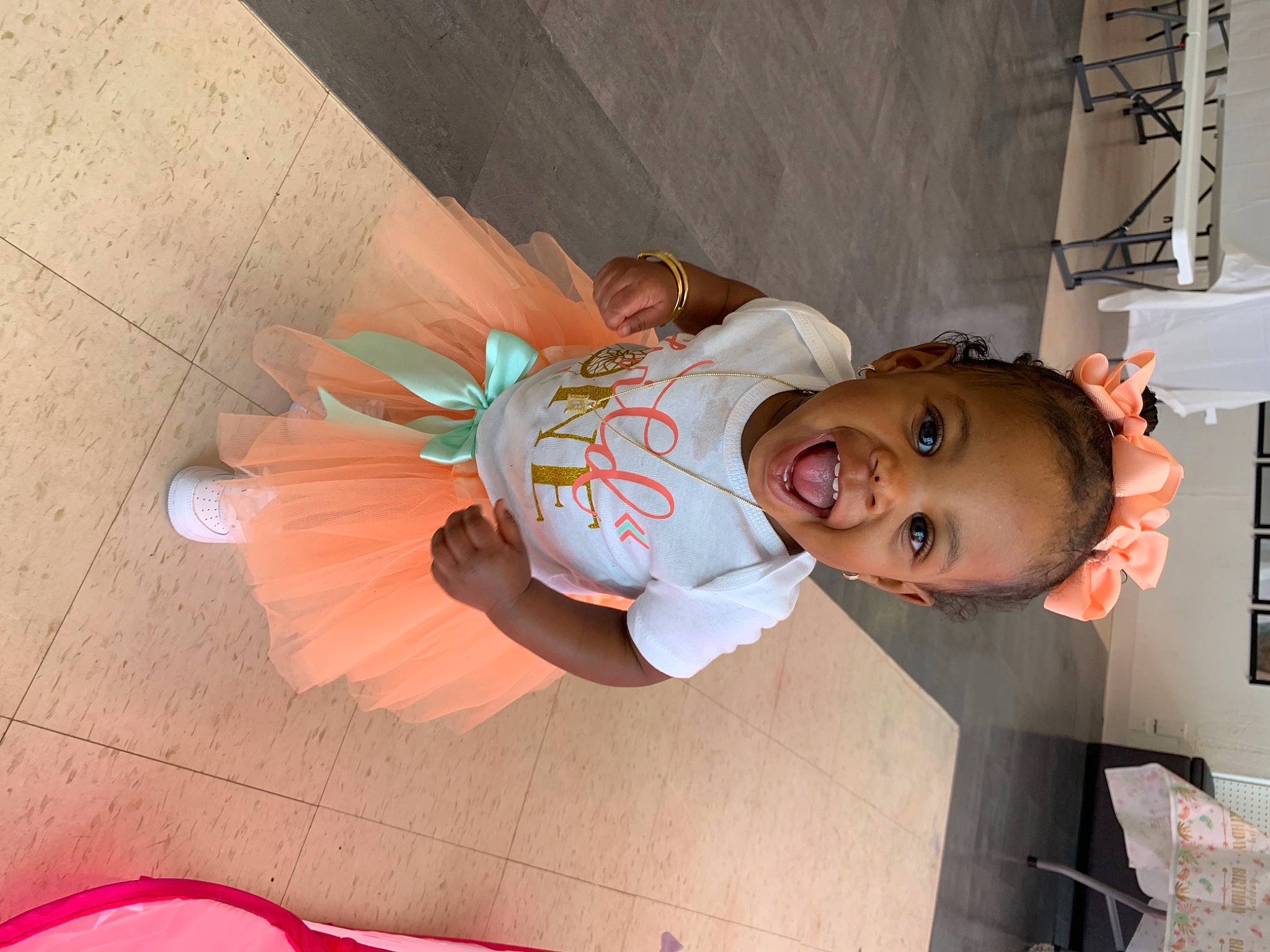 Blessyn joined the competition — help win amazing prizes! carmine, child, finger, flooring, fun, happy, hardwood, hat, human_leg, mouth, person, red, room, smile, textile, toddler, wood