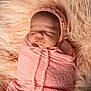 Oakley joined the competition — help win amazing prizes! baby, blanket, child, cozy, cute, face, fluffy, head, indoors, infant, knit, newborn, peaceful, pink, portrait, resting, sleeping, soft, warm, wrapped