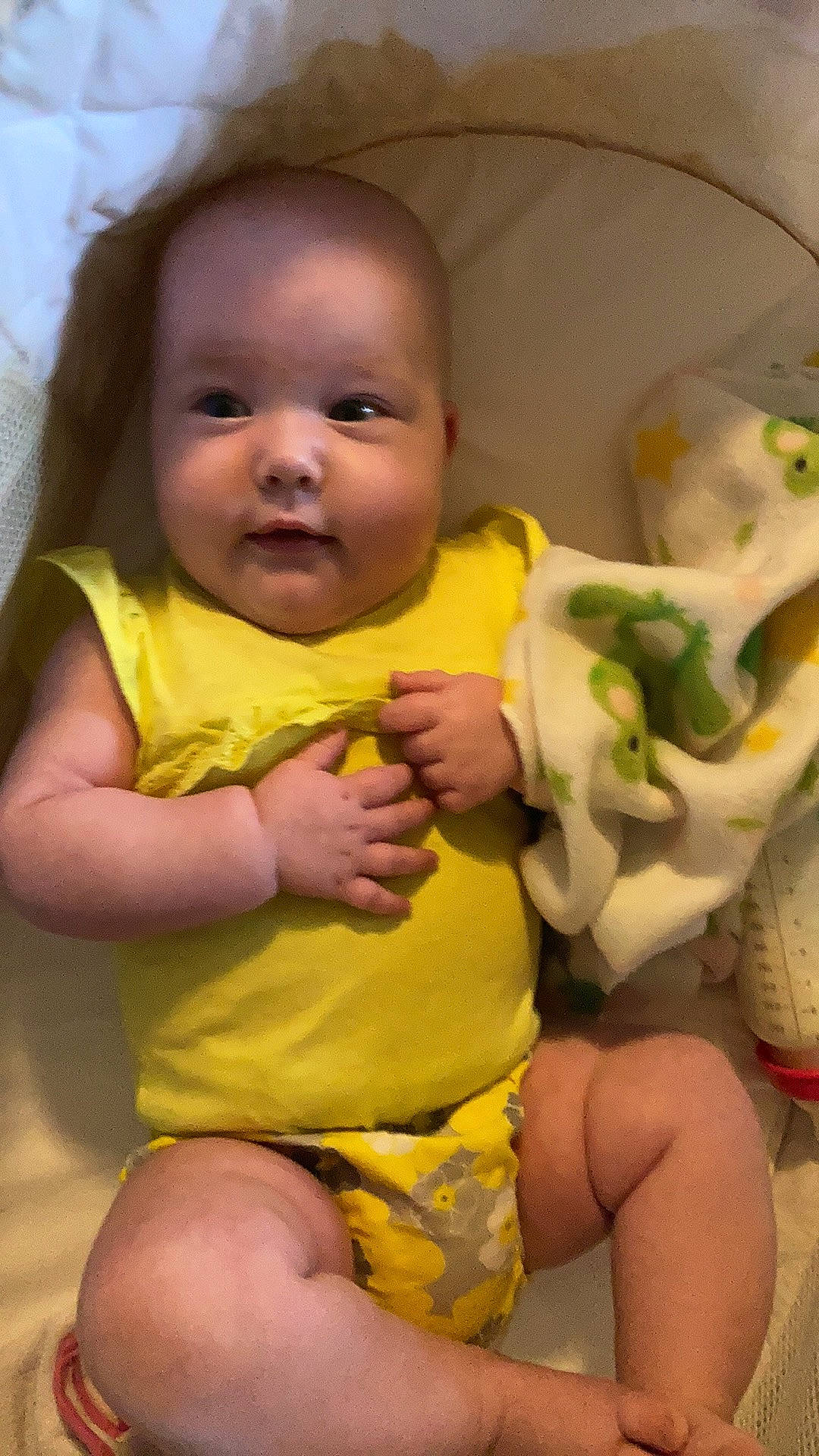 Maggie is registered to the contest to win money with this photo: baby, baby_toddler_clothing, cheek, chin, eye, face, finger, fun, happy, head, human_body, iris, mouth, nose, person, skin, smile, textile, thigh, toddler