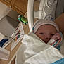 Jaylen is registered to the contest to win money with this photo: newborn, baby, hospital, blanket, hat, bed, medical_equipment, can, person, infant, wrapped, closeup, indoors, healthcare, newborn_baby, child, bedrail, striped_blanket, hospital_room, resting