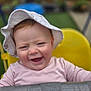 baby, baby_clothing, child, cute, face, fun, greenery, happy, hat, high_chair, infant, laughter, outdoor, person, pink_shirt, portrait, seated, smiling, sun_hat, yellow_chair
