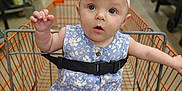 Avery is registered to the contest to win money with this photo: accessories, adult, baby, city, clothing, dress, face, furniture, hat, head, indoors, male, man, person, photography, portrait, road, shoppingcart, street, urban