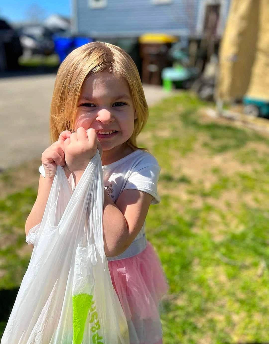 Abby joined the competition — help win amazing prizes! blond, child, dress, event, fun, gesture, grass, happy, iris, leisure, long_hair, magenta, people_in_nature, person, play, recreation, smile, toddler, travel, trunk