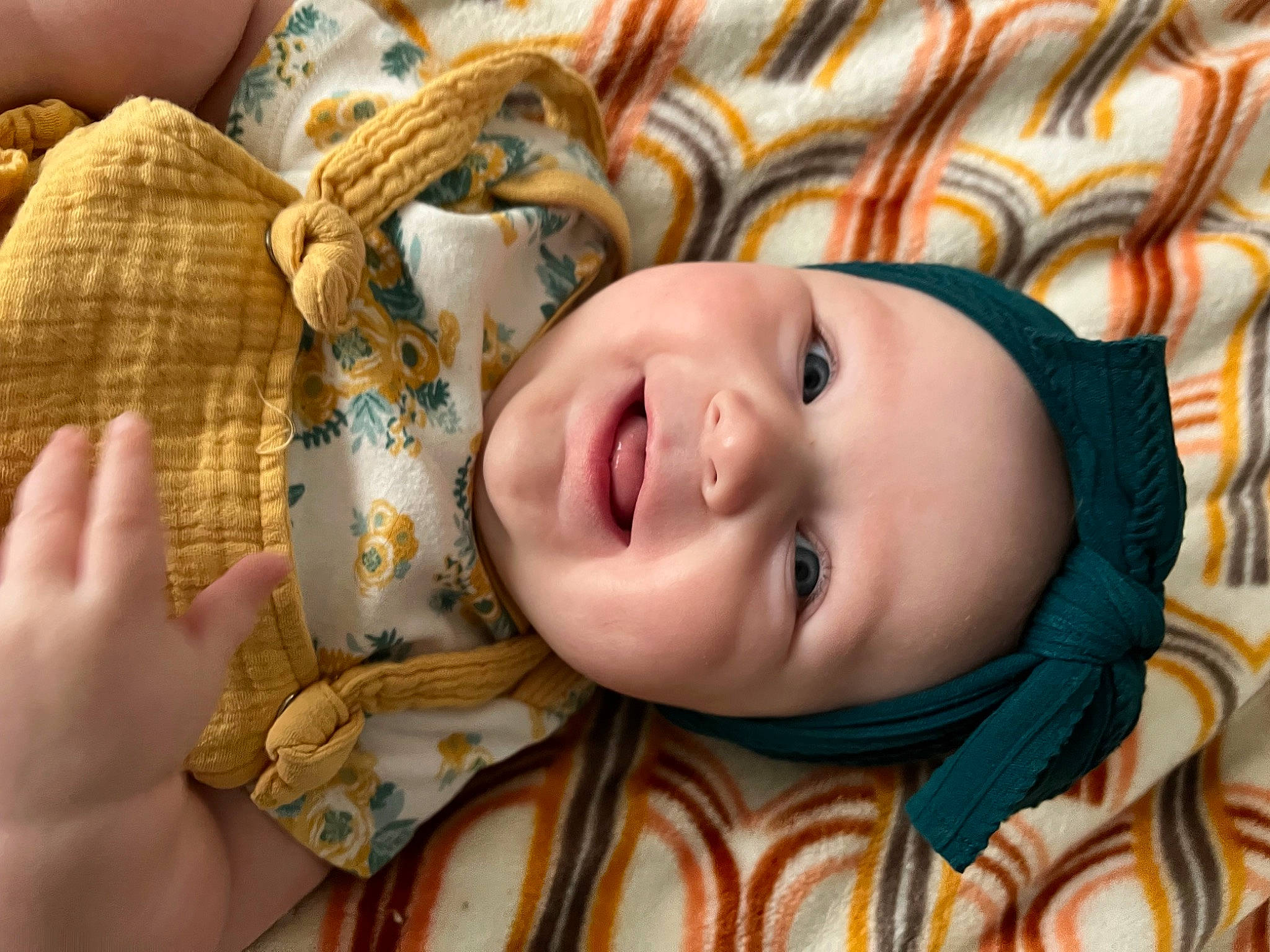 Hadleigh is registered to the contest to win money with this photo: cheek, chin, eye, eyebrow, facial_expression, hair, hand, happy, head, headwear, human_body, joy, lip, mouth, nose, people_in_nature, person, plant, skin, smile