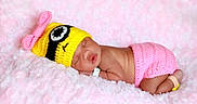 Loni is registered to the contest to win money with this photo: adorable, baby, bow, child, closeup, cozy, crocheted_hat, cute, hat, infant, newborn, peaceful, pink_blanket, pink_clothing, portrait, resting, skin, sleeping, soft_texture, yellow_hat
