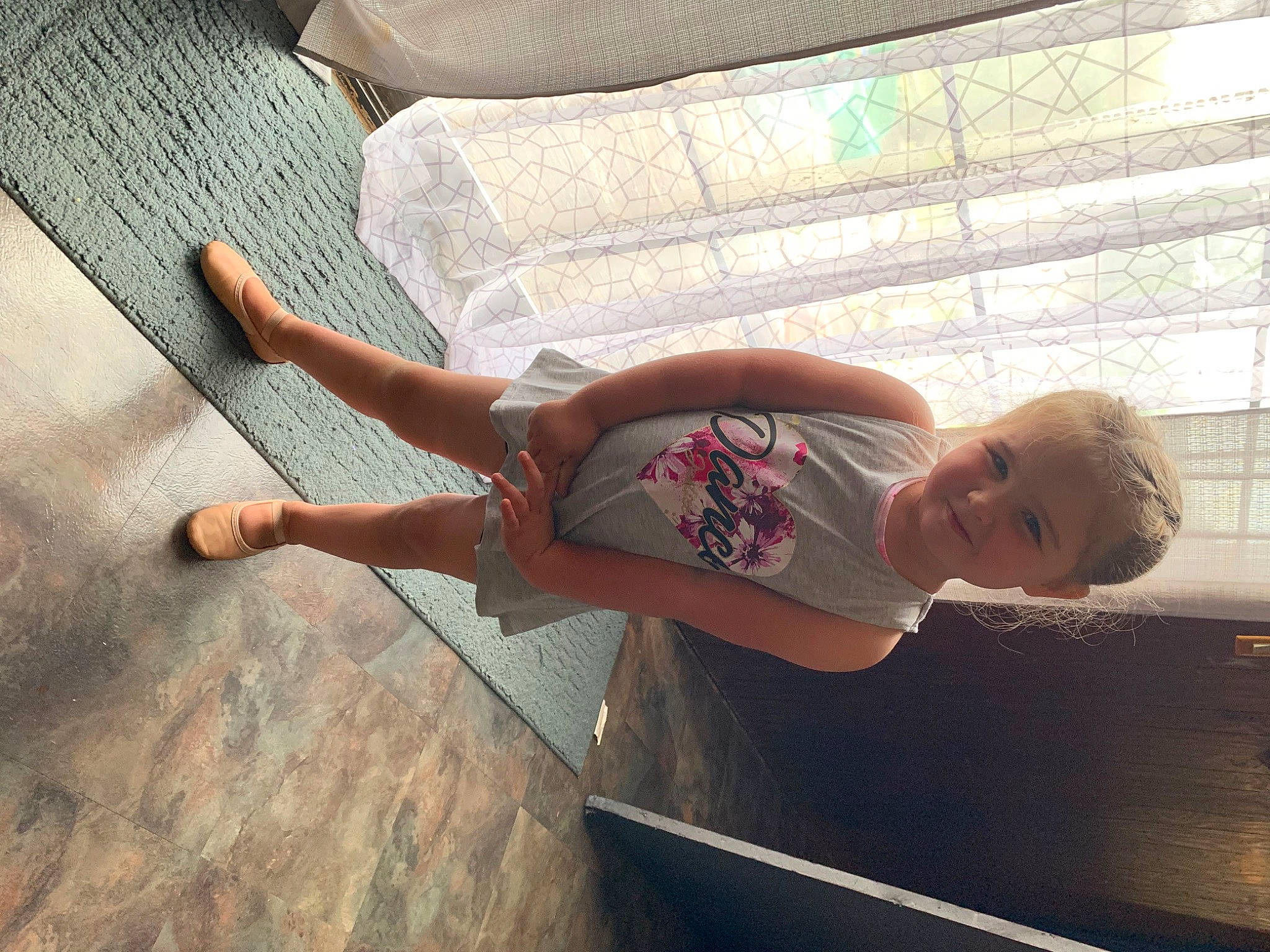 Amiyah is registered to the contest to win money with this photo: arm, automotive_exterior, child, elbow, eyewear, finger, fun, hand, happy, human_leg, joy, leisure, person, smile, summer, t_shirt, thigh, tints_and_shades, toddler, vehicle_door