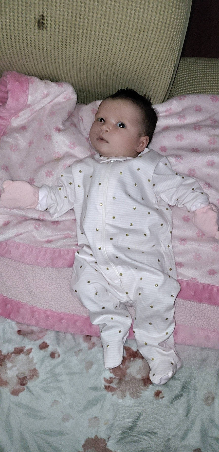 Namin'E is registered to the contest to win money with this photo: baby, baby_products, baby_toddler_clothing, bedding, cheek, child, comfort, eye, face, head, linens, monochrome, nightwear, pattern, person, pink, room, sitting, skin, sleeve