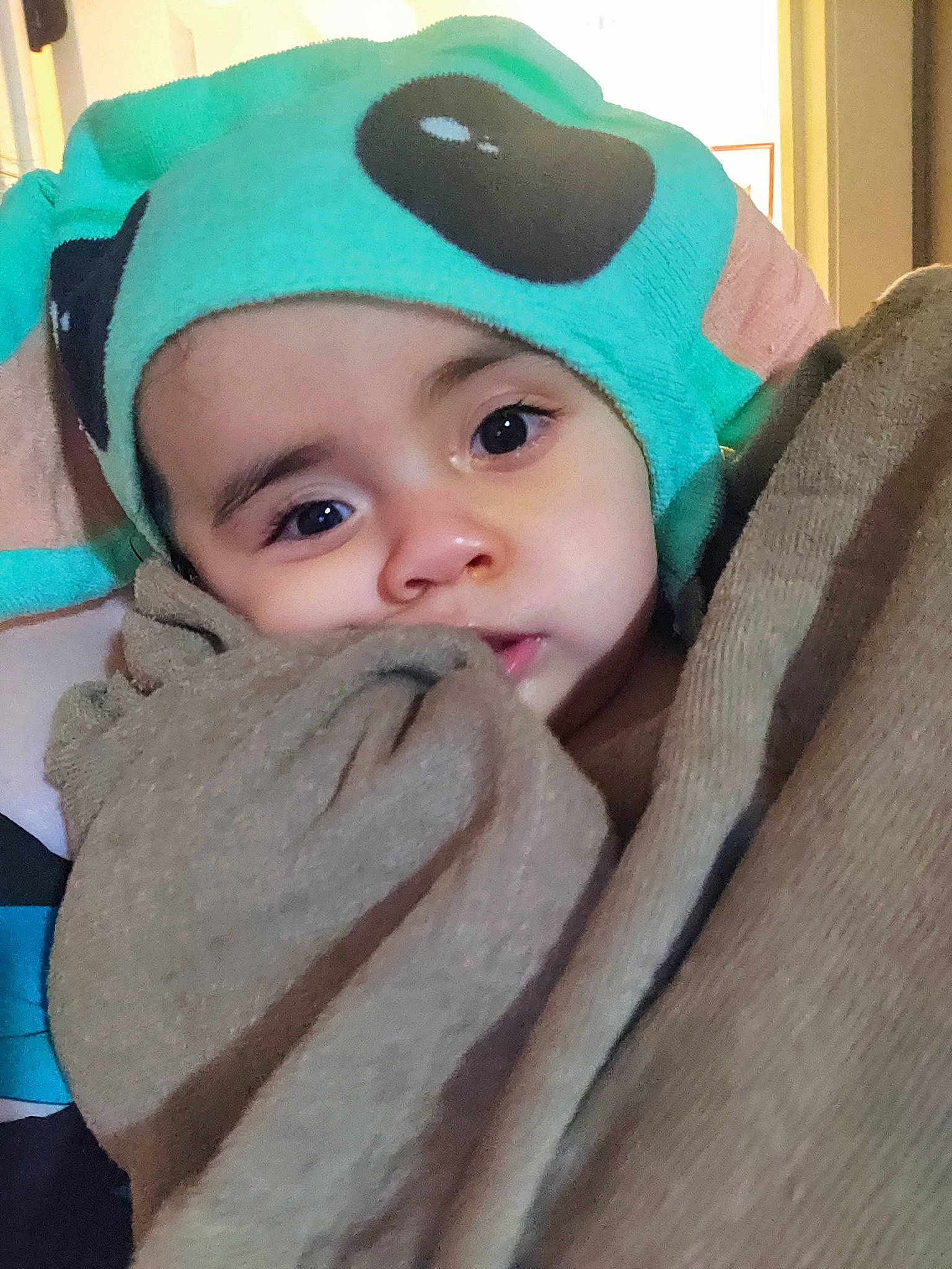 Kairi is registered to the contest to win money with this photo: baby, baby_toddler_clothing, beanie, cap, cheek, child, eye, eyebrow, eyelash, fashion_accessory, fun, hair_accessory, happy, headgear, headwear, knit_cap, neck, outerwear, person, personal_protective_equipment