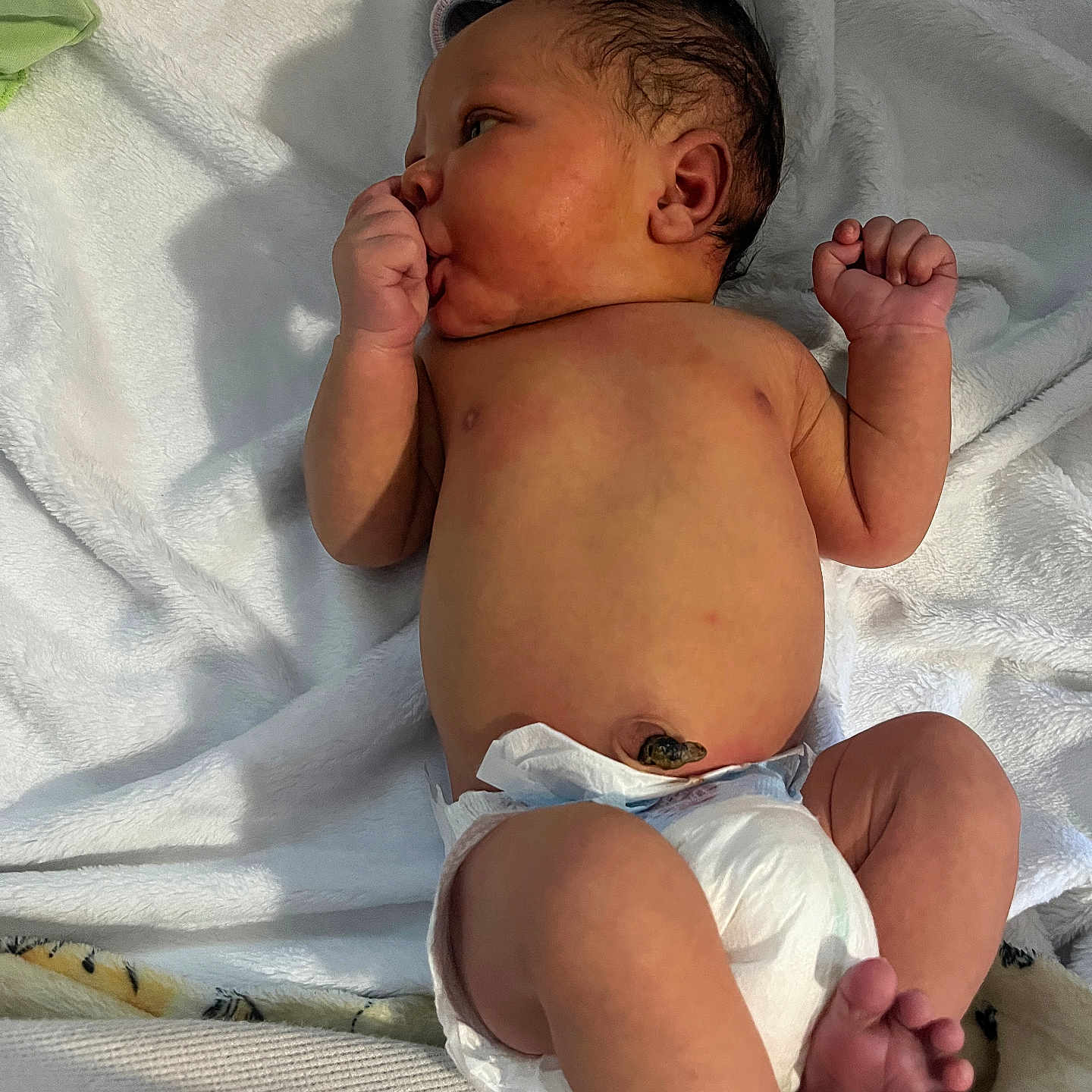 Kiyhiem Jr joined the competition — help win amazing prizes! baby, blanket, child, cute, diaper, foot, hand, headwear, hospital, indoors, infant, lying_down, newborn, person, resting, skin, sleepy, soft_texture, thumb_sucking, toe