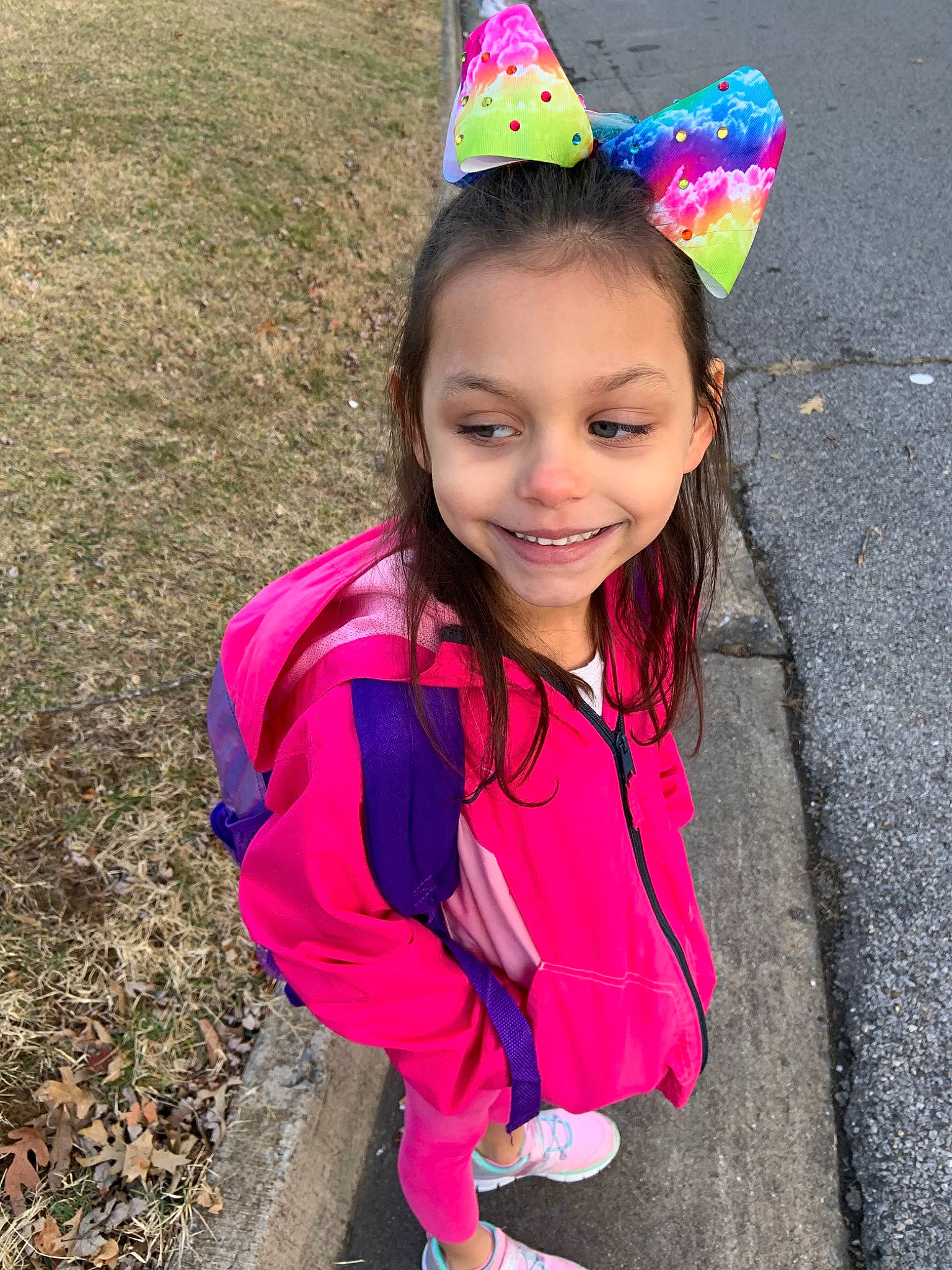 Naila is registered to the contest to win money with this photo: child, costume, ear, face, fun, happy, head, headgear, joy, party_supply, person, pink, plant, play, purple, smile, toddler, vacation