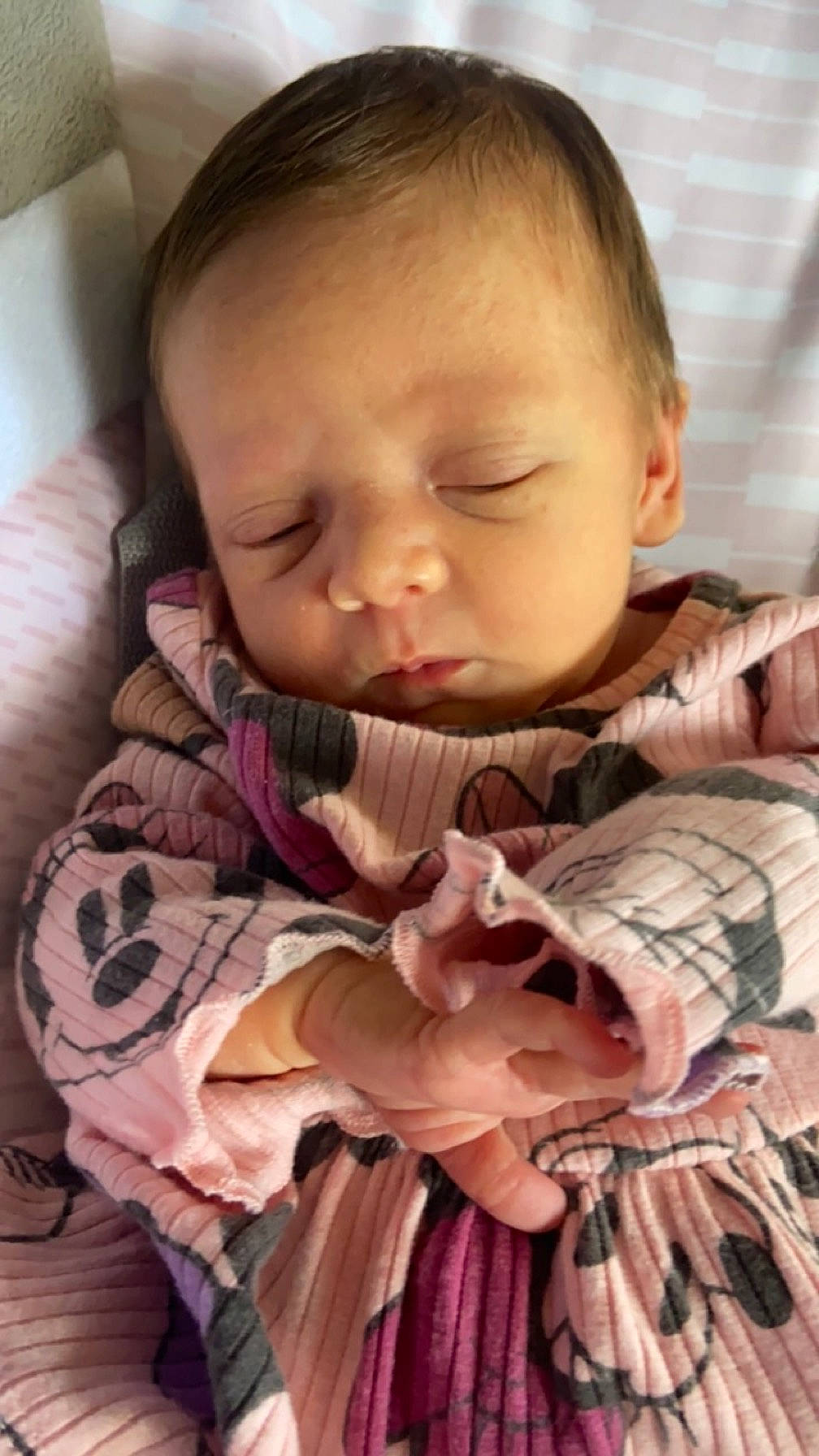 Blakelynn is registered to the contest to win money with this photo: baby, baby_products, baby_toddler_clothing, cheek, child, comfort, ear, eyelash, facial_expression, hairstyle, happy, iris, linens, lip, nose, person, pink, sitting, skin, sleeve