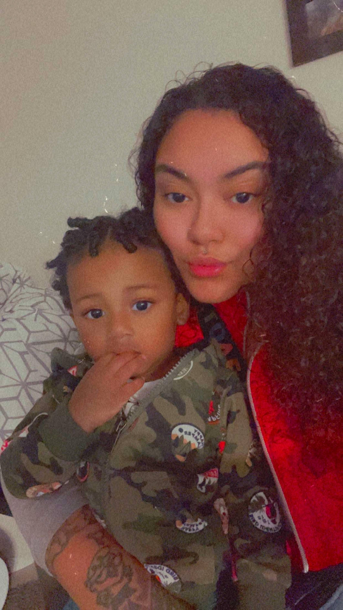 Kameron is registered to the contest to win money with this photo: black_hair, camouflage, cheek, chin, eye, eyebrow, face, facial_expression, fashion, forehead, gesture, hair, head, human, iris, lip, military_camouflage, nose, person, skin