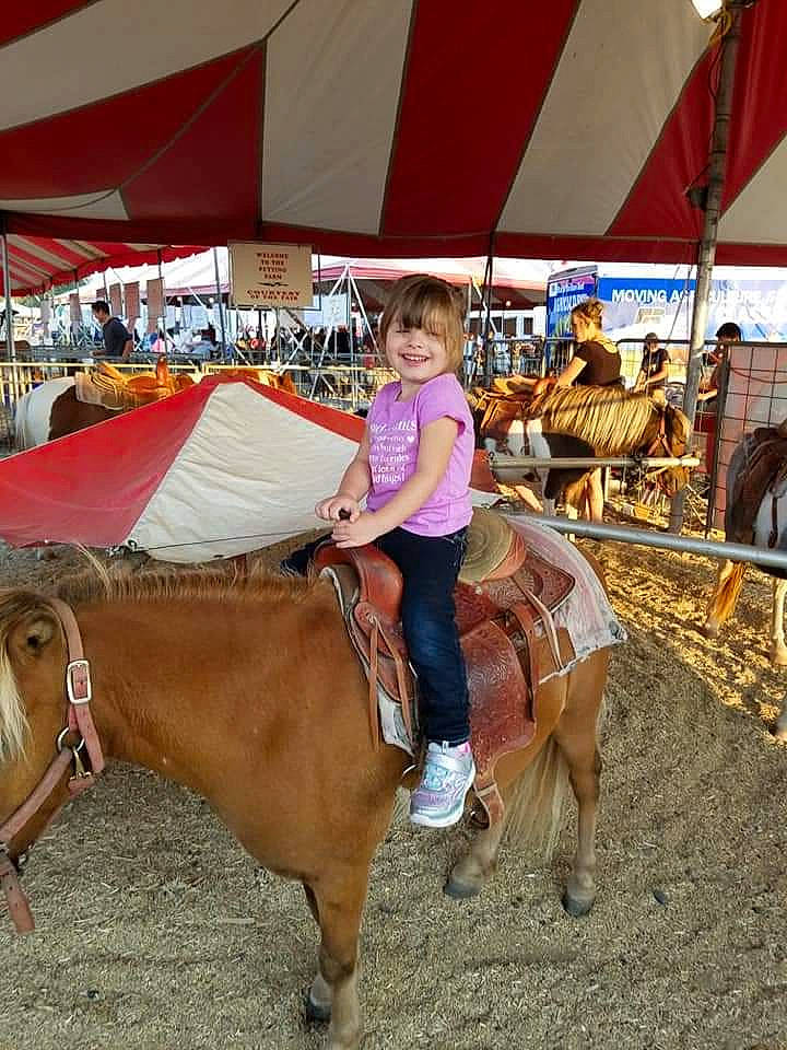 Emerald is registered to the contest to win money with this photo: animal_sports, bovine, bridle, equestrianism, horse, horse_tack, joy, livestock, mane, mare, pack_animal, person, recreation, rein, rodeo, saddle, stallion, traditional_sport