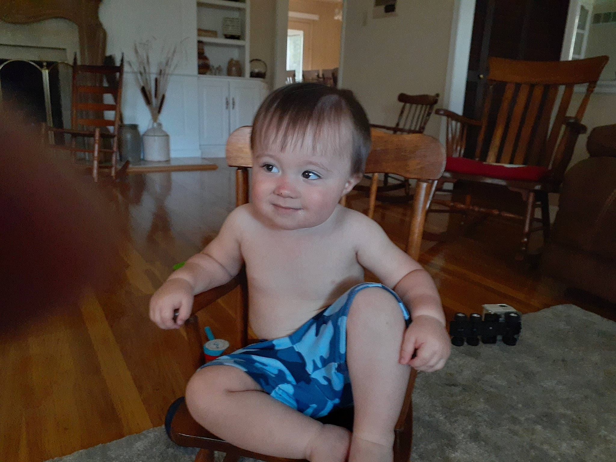 Lawrence joined the competition — help win amazing prizes! baby_toddler_clothing, chair, cheek, chest, fawn, finger, floor, flooring, furniture, hardwood, iris, joint, joy, living_room, person, skin, smile, thigh, thumb, toddler