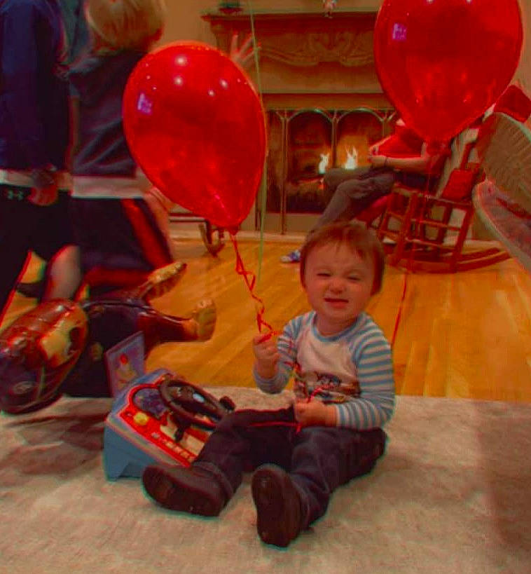 Lawrence is registered to the contest to win money with this photo: balloon, child, event, flooring, fun, happy, holiday, leisure, magenta, organ, party_supply, person, pink, recreation, red, room, smile, snapshot, t_shirt, toddler