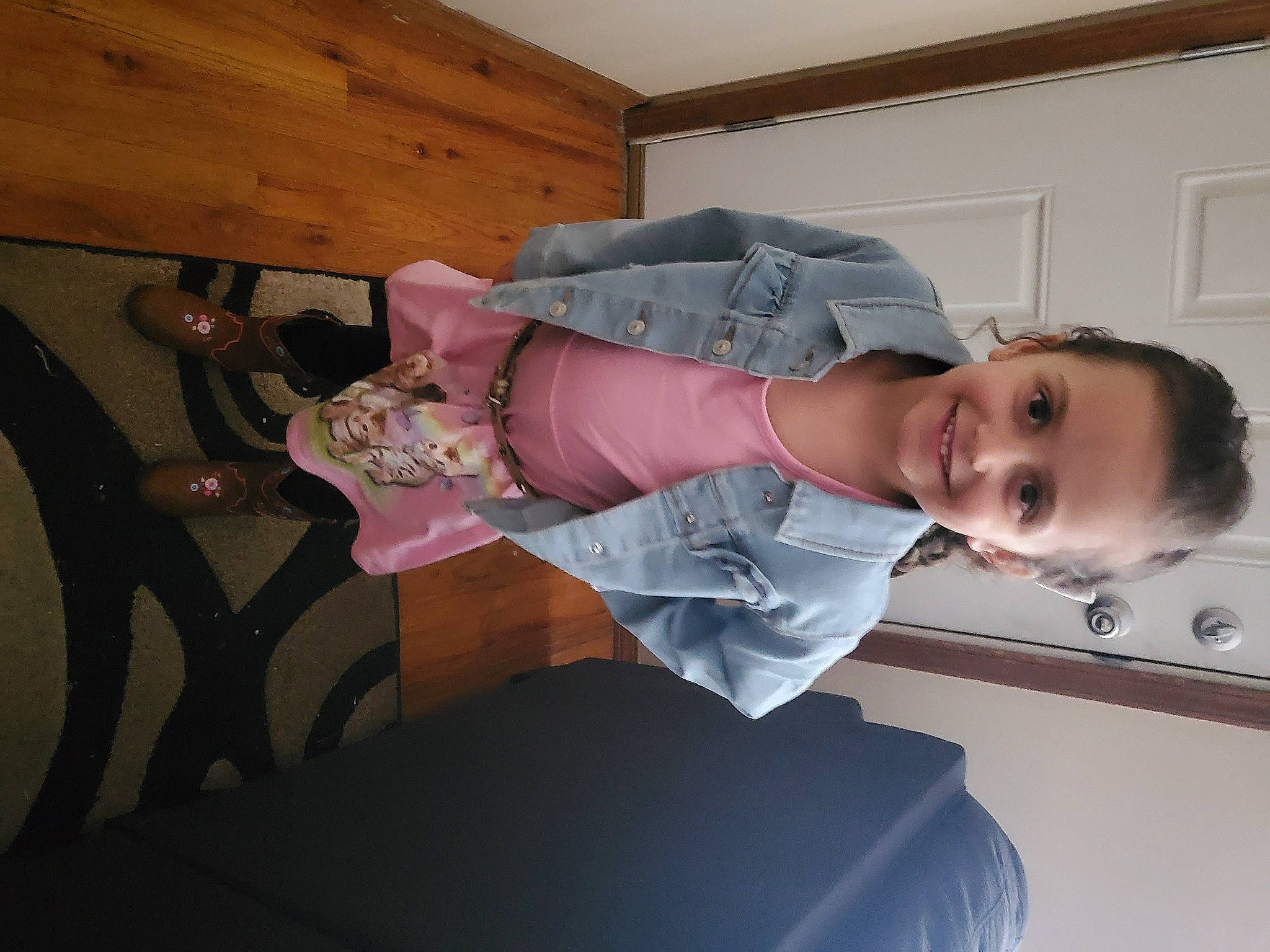 Madison is registered to the contest to win money with this photo: baby, baby_products, baby_toddler_clothing, child, comfort, dress, eye, fun, happy, head, human_body, joy, leg, person, room, sitting, smile, suit, thigh, tie