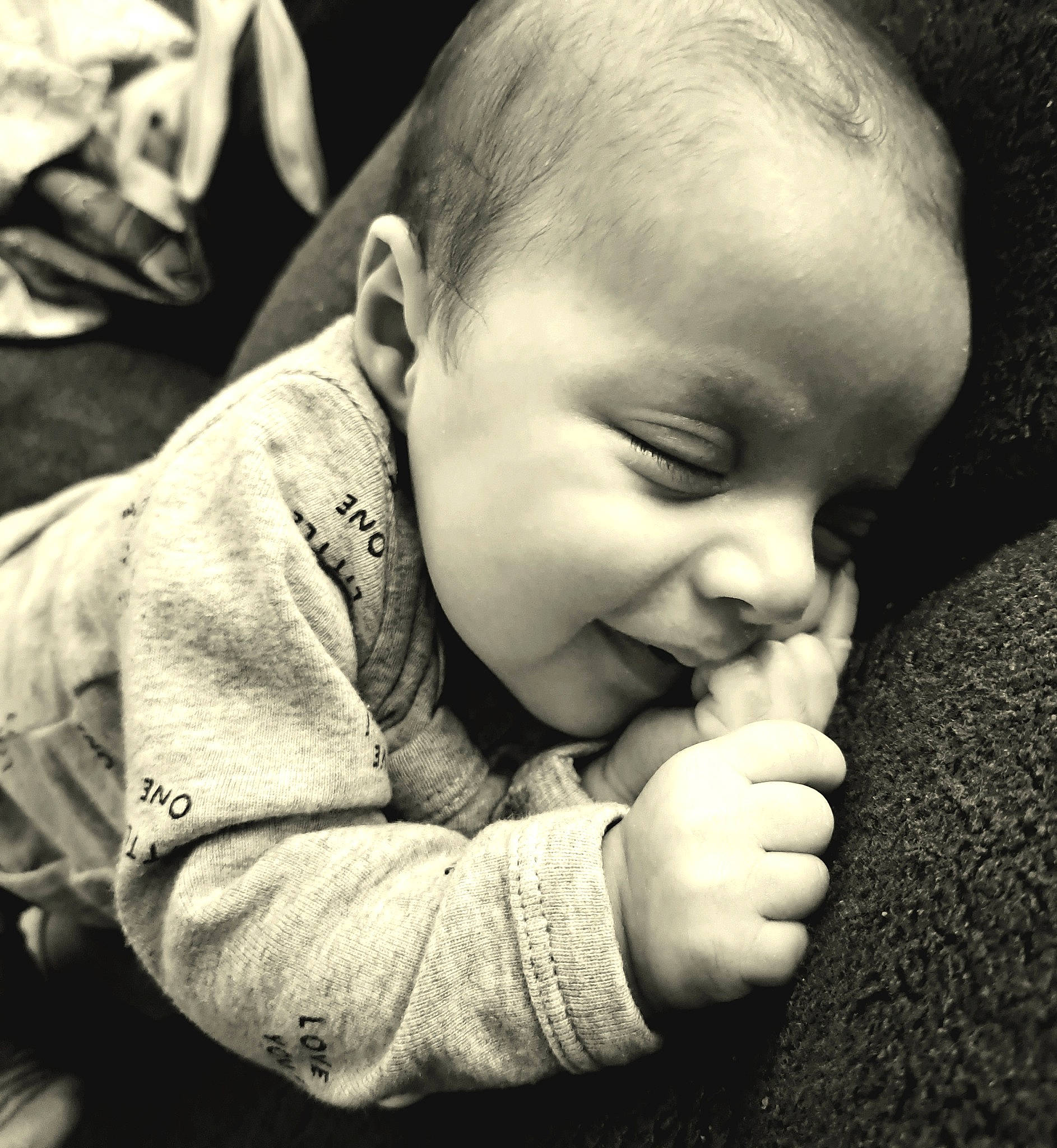 Harley joined the competition — help win amazing prizes! baby, black_and_white, cheek, chin, ear, eye, finger, flash_photography, gesture, hand, happy, human_body, iris, lip, mouth, nose, person, photograph, skin, smile