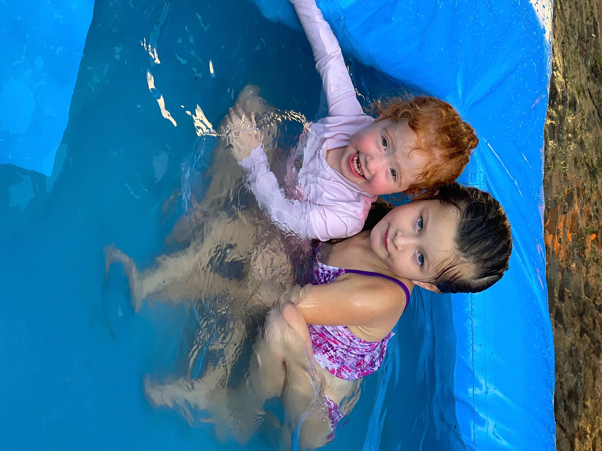 Addilynn is registered to the contest to win money with this photo: aqua, arm, azure, child, electric_blue, event, fun, gesture, happy, joy, leisure, people_in_nature, person, play, recreation, smile, summer, swimming_pool, swimwear, toddler