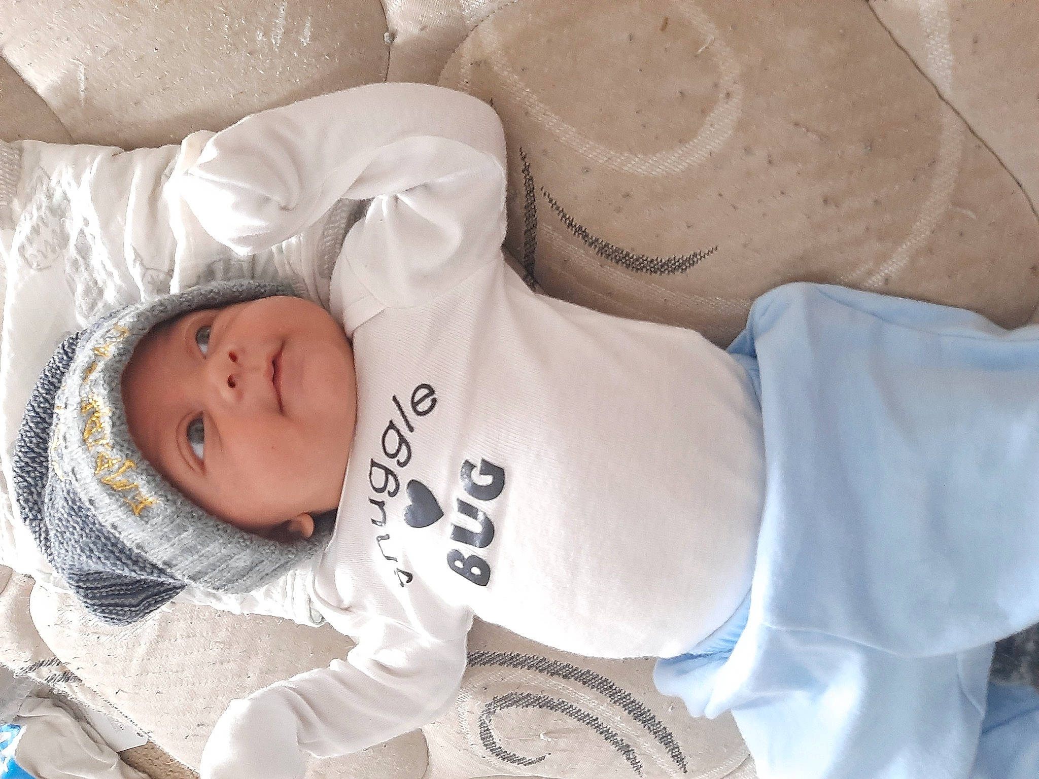 Prince Angel is registered to the contest to win money with this photo: baby, baby_products, baby_safety, baby_sleeping, baby_toddler_clothing, bedtime, chest, child, clothing, comfort, eye, headgear, headwear, human_leg, linens, nap, person, skin, sleep, sleeve