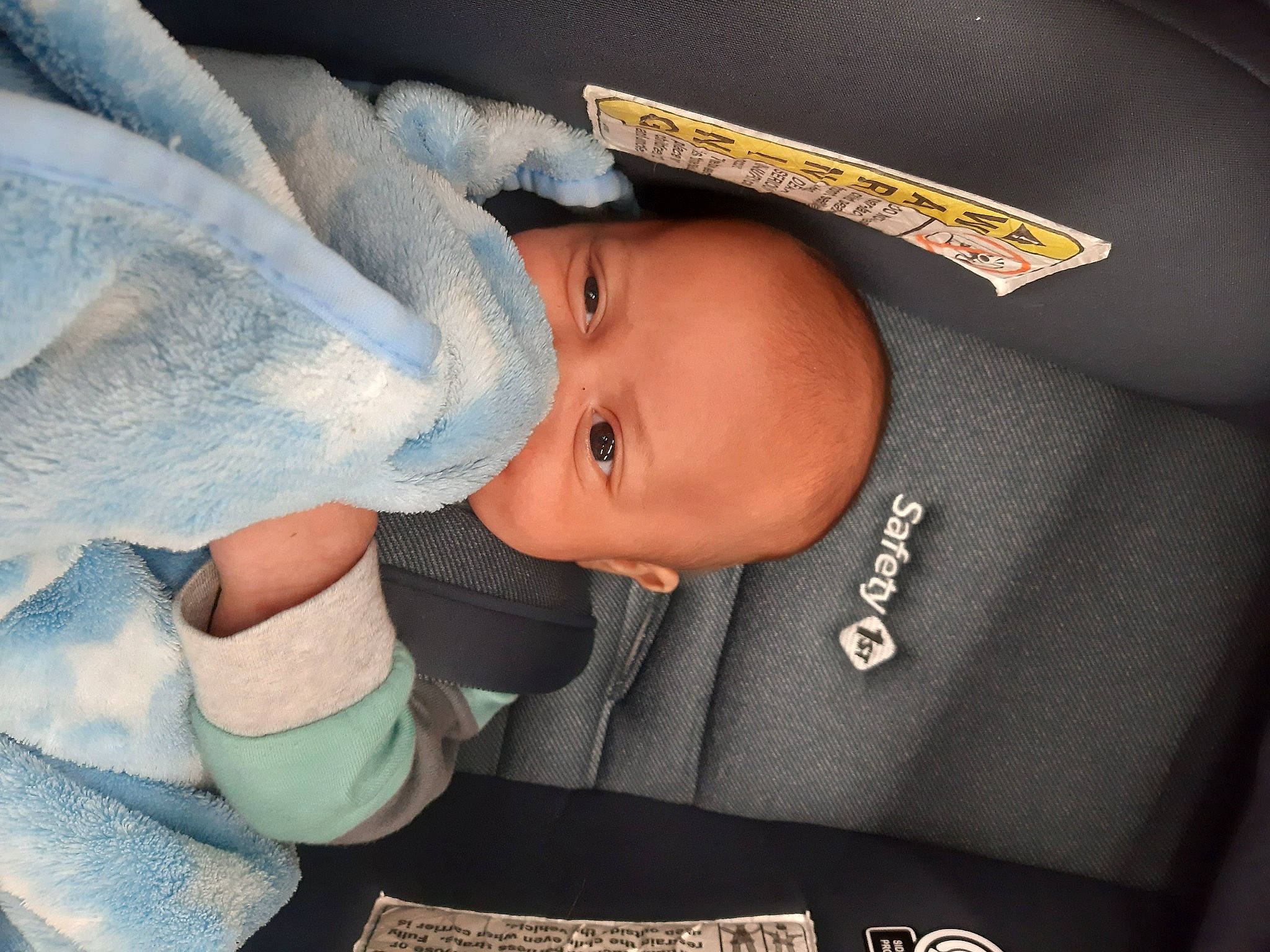 Prince Angel is registered to the contest to win money with this photo: baby, baby_products, baby_sleeping, baby_toddler_clothing, beanie, cap, car_seat, child, comfort, fashion_accessory, finger, hat, linens, person, toddler