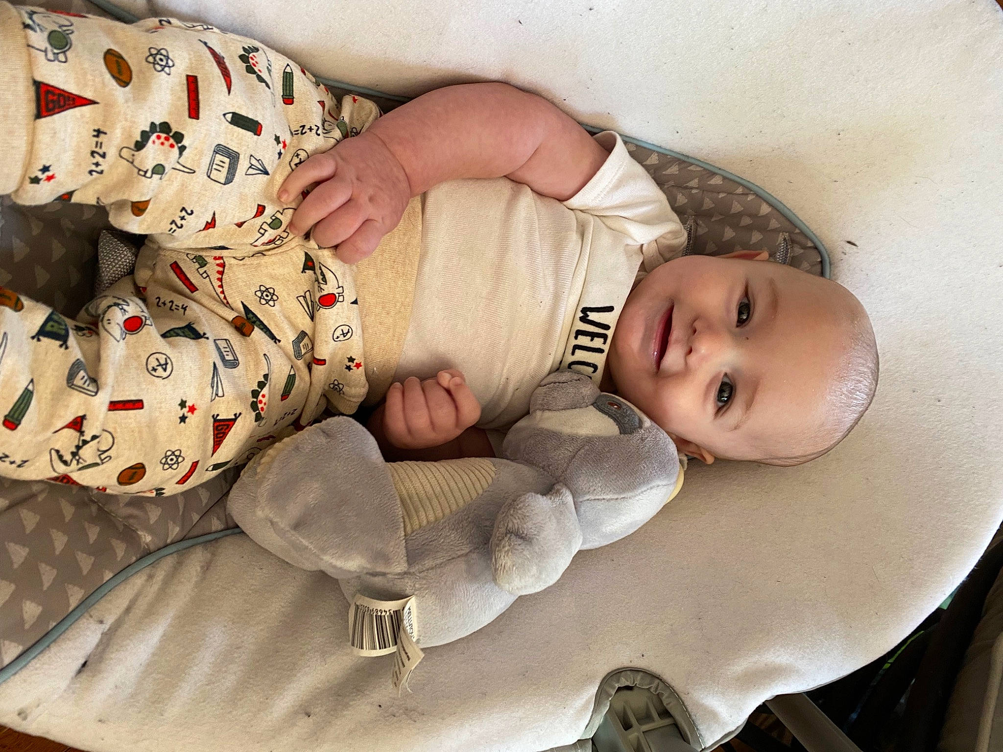 Waylen joined the competition — help win amazing prizes! abdomen, arm, baby, baby_products, baby_sleeping, baby_toddler_clothing, cheek, child, comfort, facial_expression, hand, head, human_body, joy, linens, pattern, person, sitting, skin, sleeve