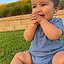 Maverick joined the competition — help win amazing prizes! baby, child, smiling, grass, outdoor, blue_clothing, happy, sitting, hands, face, nature, sunlight, greenery, garden, cute, portrait, infant, young_child, daylight, skin