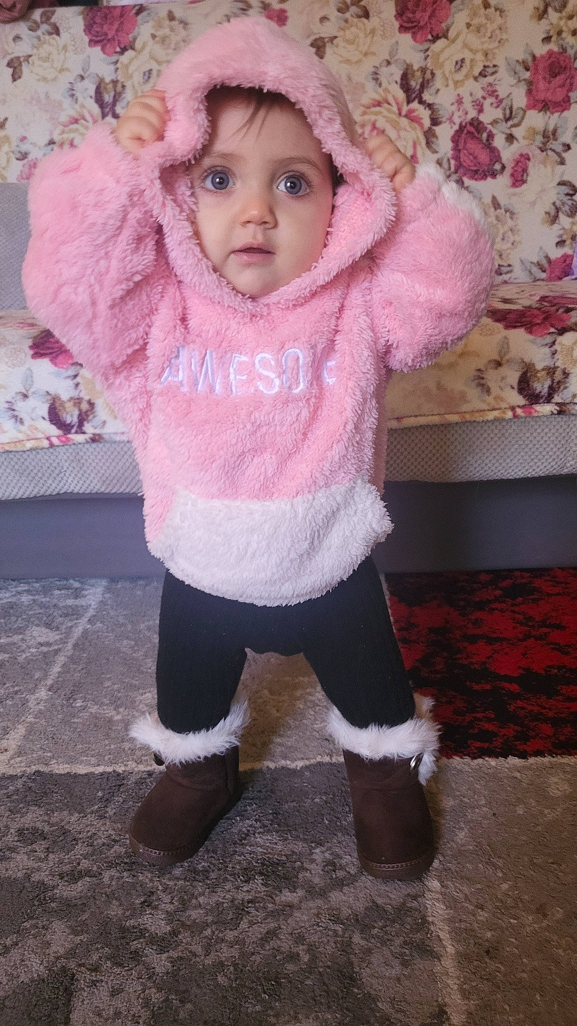 Emily Stefania a rejoint le concours — aidez-le/la à gagner de superbes lots ! baby, baby_products, baby_toddler_clothing, cap, cheek, child, eye, eyelash, face, fashion_accessory, fur, head, headwear, magenta, pattern, person, pink, sleeve, sock, toddler