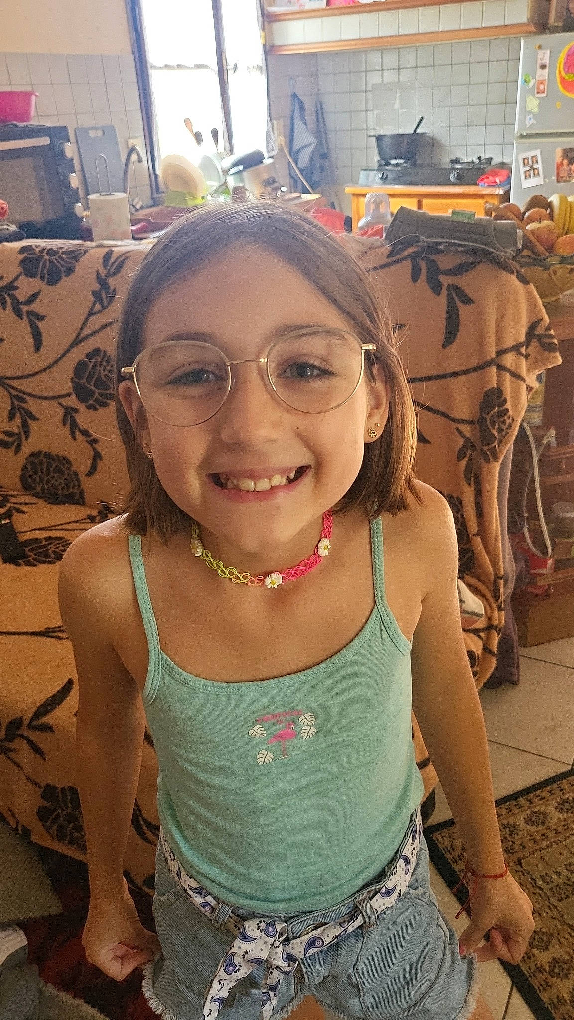 Antonia Maria participe au concours pour gagner de l'argent avec cette photo : chest, cool, eyewear, facial_expression, fashion, fun, glasses, happy, joy, leisure, long_hair, mammal, mouth, person, shoulder, skin, sleeveless_shirt, smile, thigh, travel