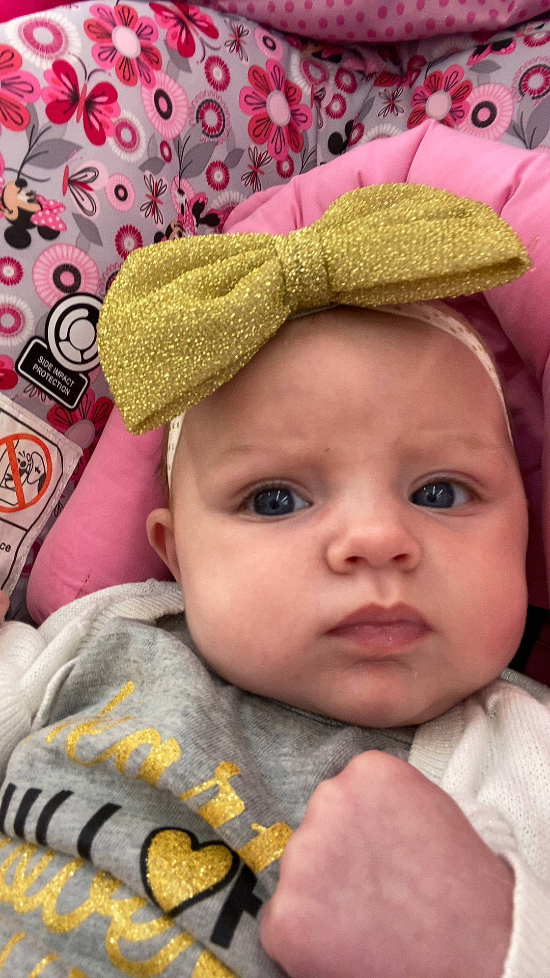 Emberlee joined the competition — help win amazing prizes! baby, cap, cheek, chin, eye, eyebrow, face, happy, head, headgear, headwear, human_body, lip, nose, outerwear, person, photograph, pink, plant, skin