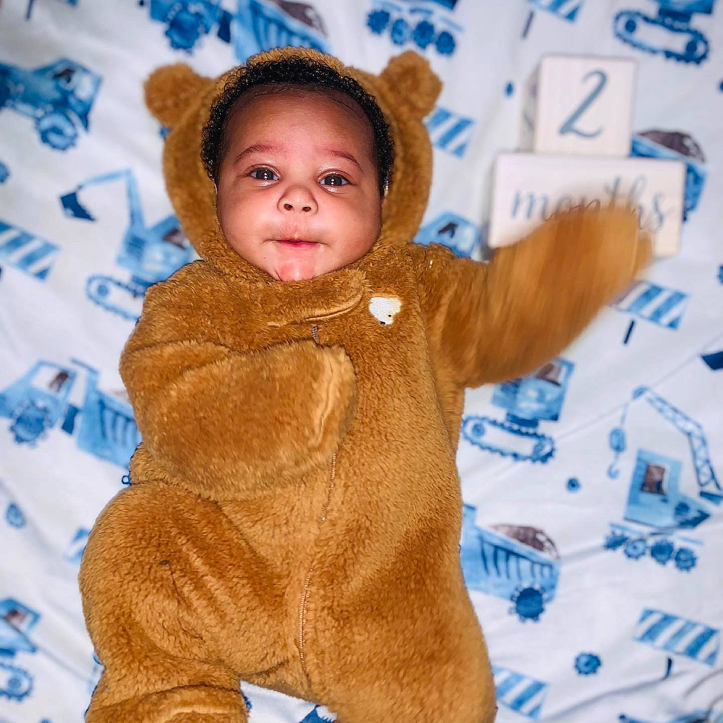 Kahree joined the competition — help win amazing prizes! arm, baby, baby_toddler_clothing, blue, cheek, child, electric_blue, face, fur, gesture, happy, jacket, leisure, linens, outerwear, person, sleeve, smile, textile, thumb