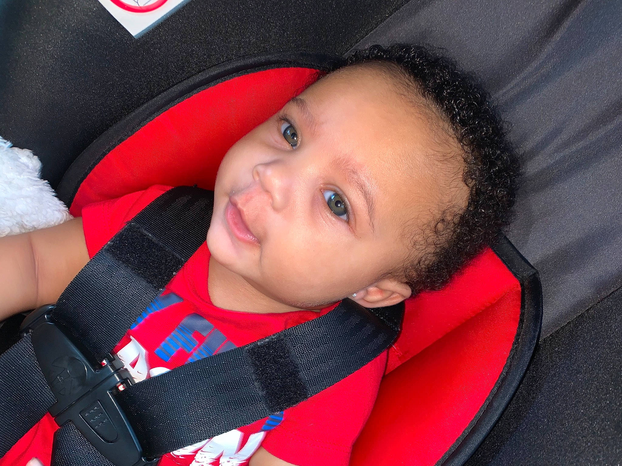 Kahree is registered to the contest to win money with this photo: baby, baby_carriage, baby_toddler_clothing, cheek, child, comfort, eyebrow, happy, iris, lip, material_property, nose, people, person, pink, red, skin, sleeve, smile, textile