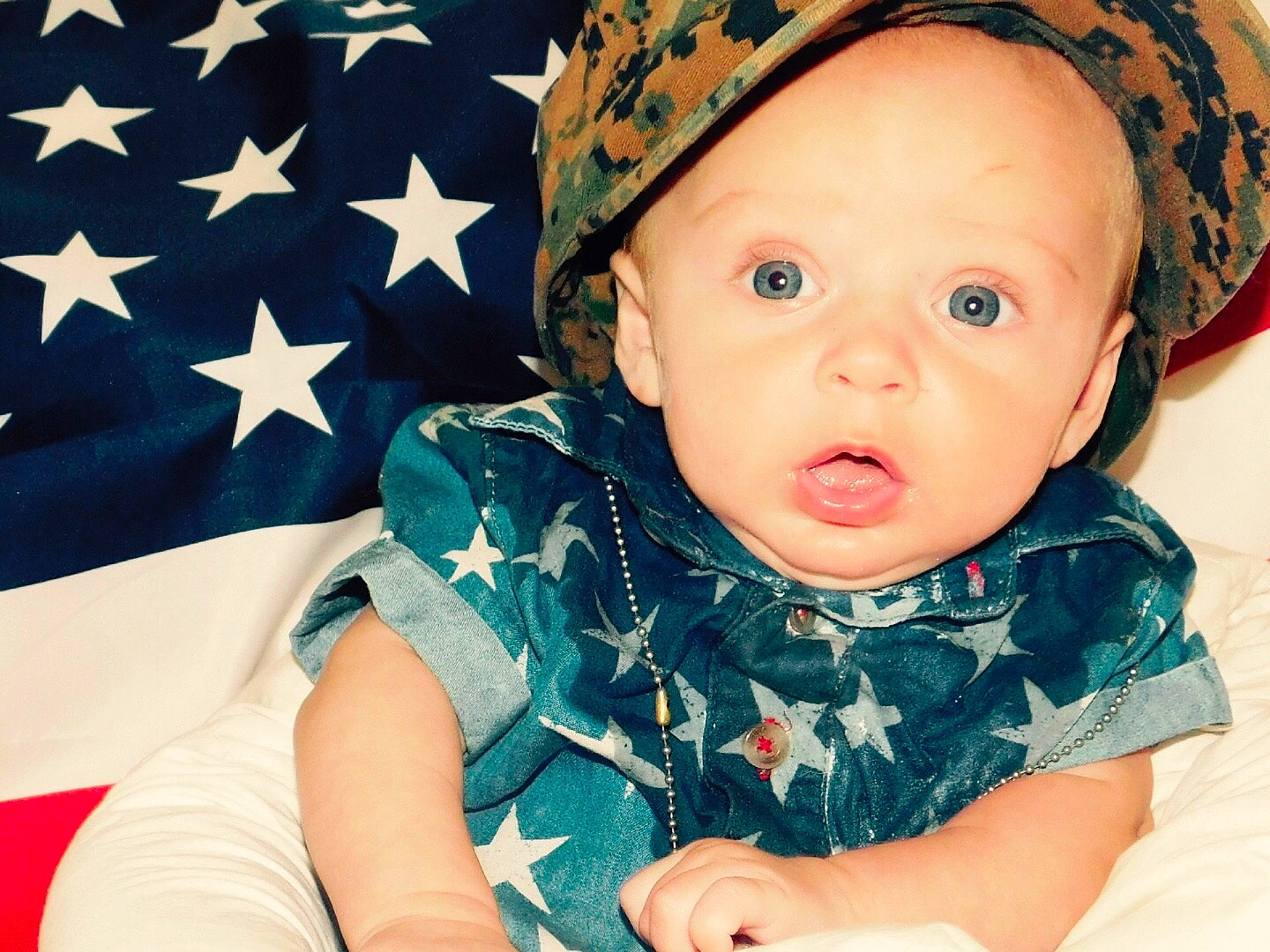 Cayden is registered to the contest to win money with this photo: beanie, boy, cap, cheek, child, cool, eye, girl, headgear, infant, nose, person, product, skin, smile, sun_hat, surprise, toddler