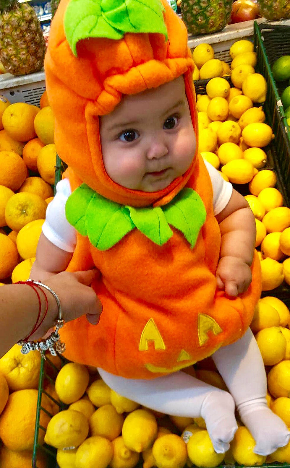 Barbara joined the competition — help win amazing prizes! banana, calabaza, child, citrus, food, fruit, headwear, infant, local_food, natural_foods, orange, person, plant, produce, pumpkin, smile, squash, vegetable, vegetarian_food, winter_squash