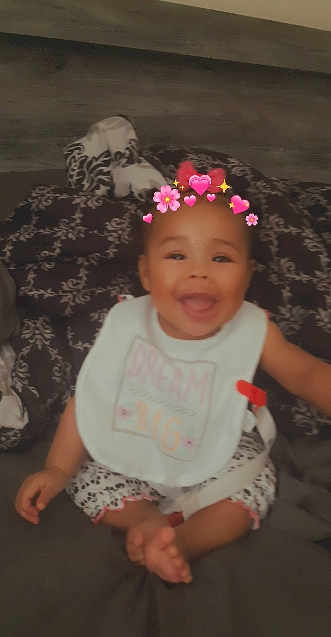 Jurnei Love joined the competition — help win amazing prizes! baby, baby_products, baby_toddler_clothing, cheek, child, costume_accessory, facial_expression, finger, hair_accessory, hand, happy, headband, headgear, headpiece, mouth, nose, person, petal, pink, skin