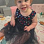Elena joined the competition — help win amazing prizes! toddler, child, smiling, dress, stars, polka_dot, sitting, quilt, indoor, happy, face, hand, blue_eyes, short_hair, colorful, toy, blanket, play_area, cute, portrait