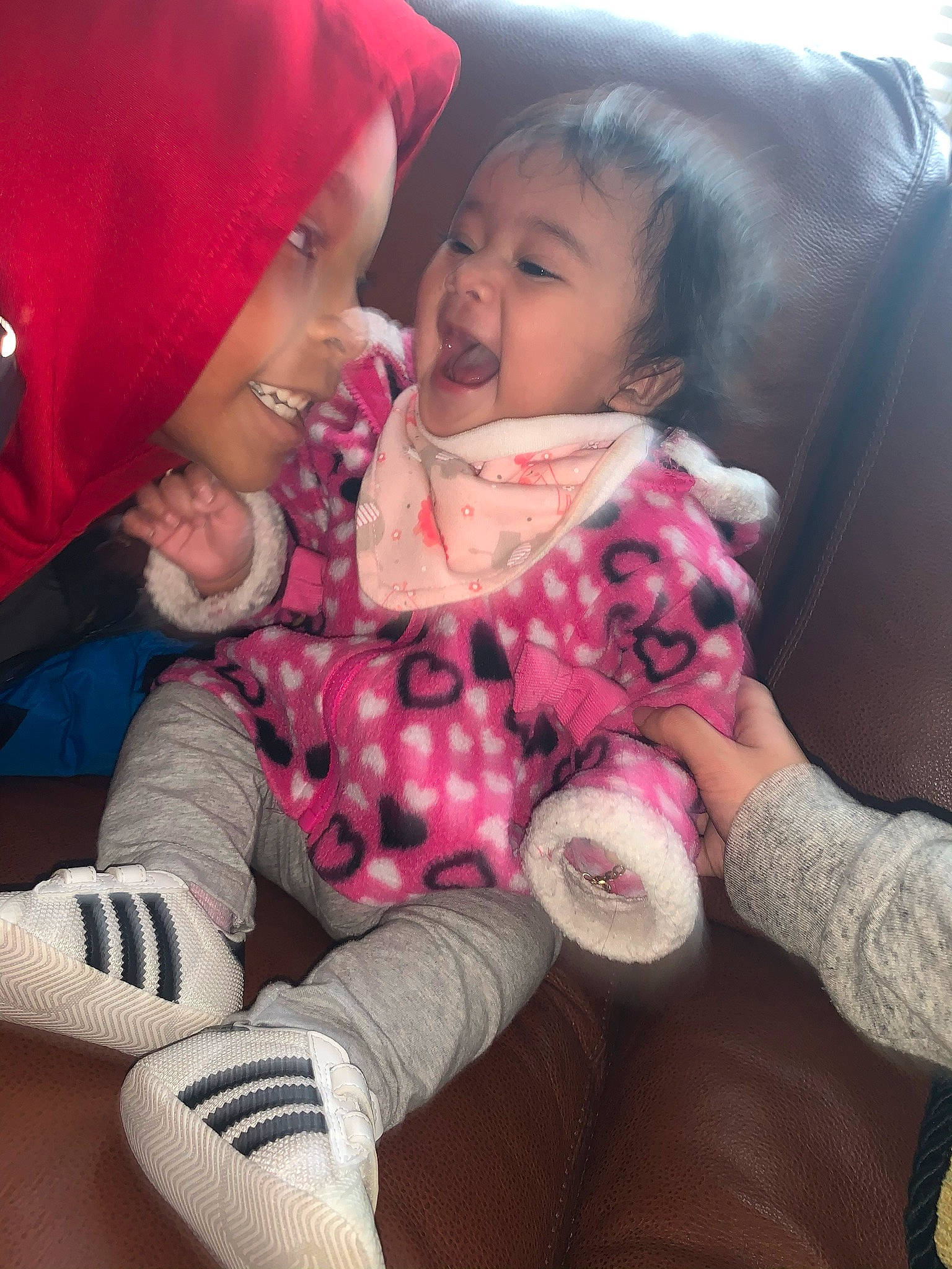 Jacqueline joined the competition — help win amazing prizes! baby, baby_toddler_clothing, comfort, cool, finger, gesture, hand, happy, interaction, knee, lap, leg, lip, mouth, organ, person, pink, product, skin, smile