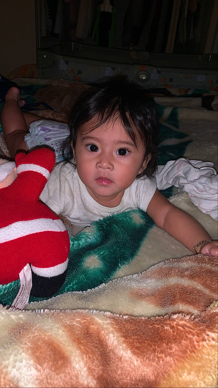 Jacqueline joined the competition — help win amazing prizes! baby, baby_toddler_clothing, cheek, child, comfort, eyebrow, flooring, fun, hairstyle, human_body, iris, linens, mouth, nose, person, room, sitting, skin, sleeve, toddler