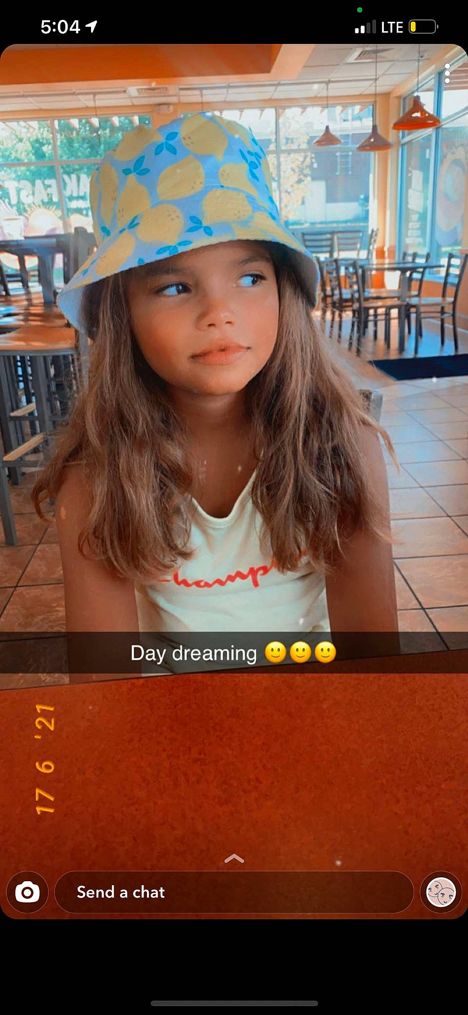 Vanessa is registered to the contest to win money with this photo: beauty, blond, cap, chair, chin, cool, fun, hairstyle, happy, hard_hat, hat, headwear, helmet, human, leisure, light, mammal, people, person, photograph