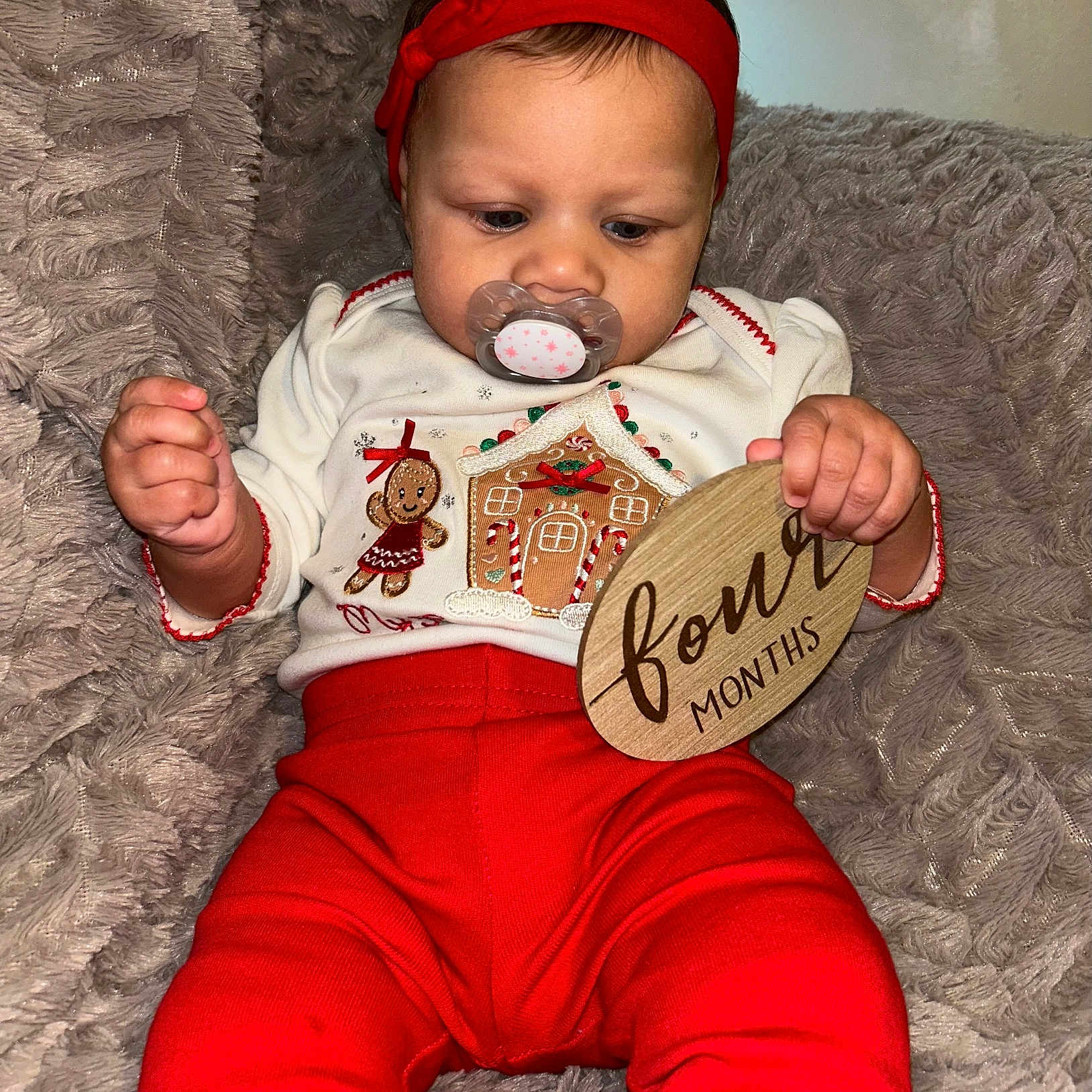 Charleigh is registered to the contest to win money with this photo: accessories, baby, bodypart, clothing, couch, cushion, cutlery, face, finger, furniture, hand, head, homedecor, pants, person, photography, portrait, sitting, spoon, t_shirt