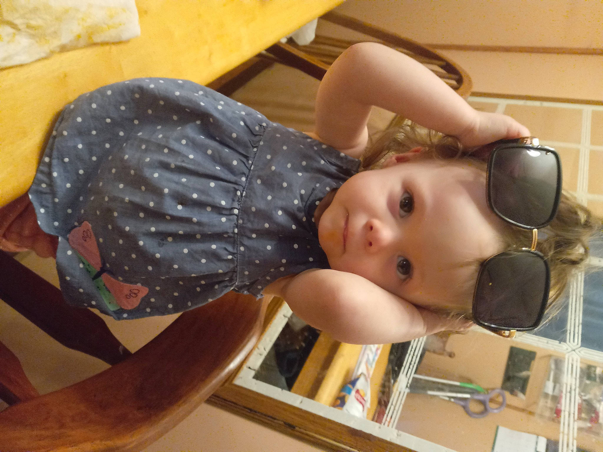 Paisley Makenna is registered to the contest to win money with this photo: baby, baby_products, child, comfort, ear, eyelash, eyewear, flooring, fun, pattern, person, personal_protective_equipment, room, sunglasses, thigh, toddler, vacation, wood